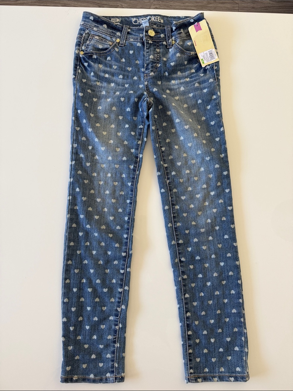 NEW Cherokee blue jeans with heart design. Girls Skinny size 12